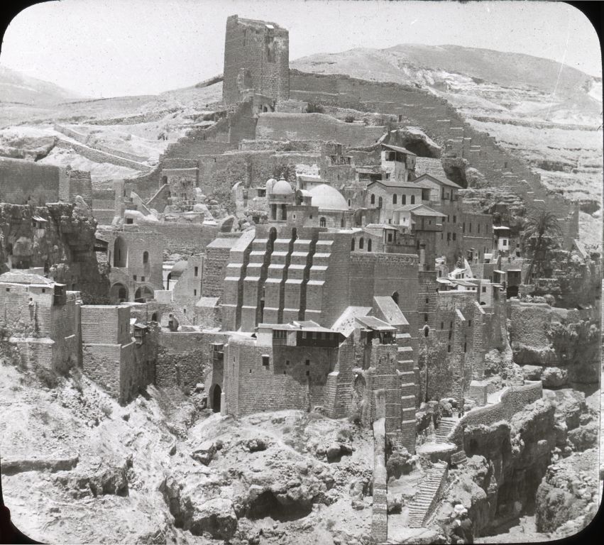 An ancient convent carved out of desert rock.