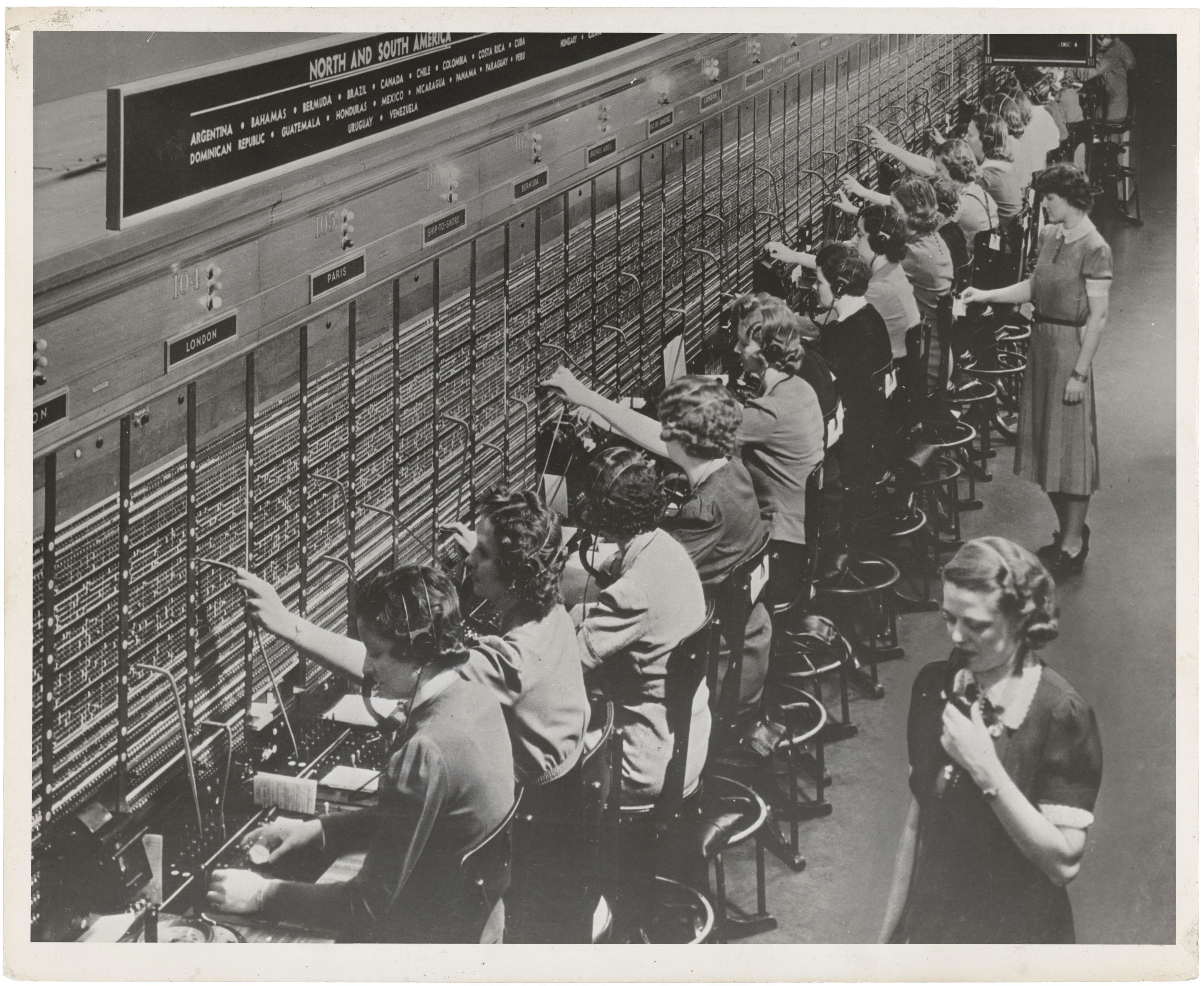 Women working at a Bell System telephone switchboard, circa 1945.